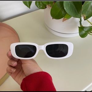 Chunky white glasses